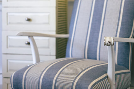 A blue and white striped chair at The Charles Hotel in Niagara-on-the-Lake.