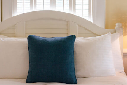 Pillows on a bed at The Charles Hotel in Niagara-on-the-Lake.