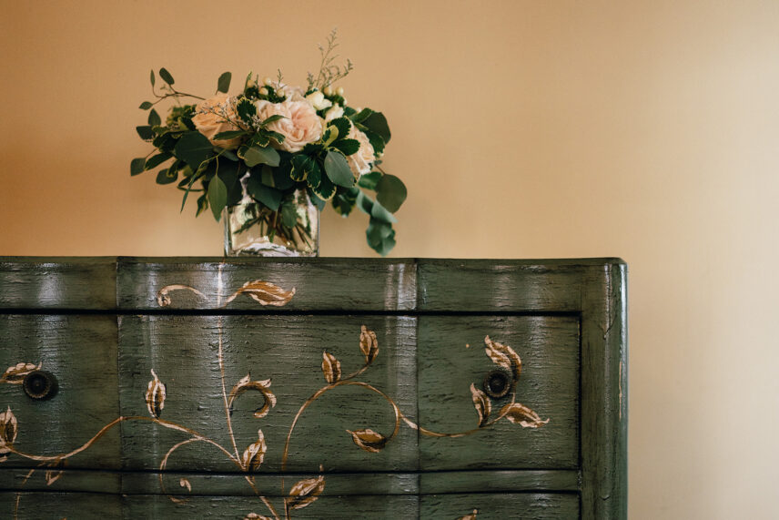 Flowers on top of a dresser in the Newark Room in The Charles Hotel in Niagara-on-the-Lake.