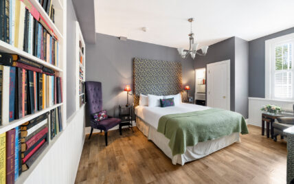 A king sized bed in the Library Room at The Charles Hotel in Niagara-on-the-Lake.