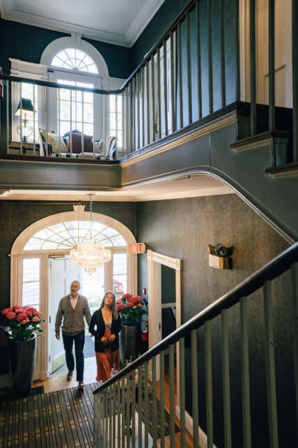 A couple entering Niagara's Finest Hotels