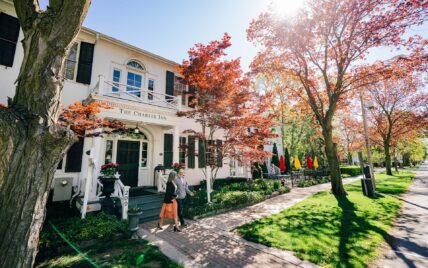 A couple walking out of The Charles Hotel in Niagara-on-the-Lake.