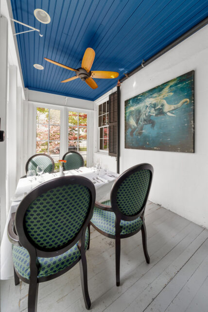 A covered patio dining space at the HobNob Restaurant and Wine Bar in The Charles Hotel in Niagara-on-the-Lake.