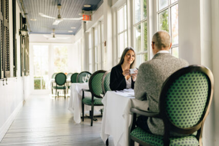 A couple at a restaurant table at The Charles Hotel in Niagara-on-the-Lake.