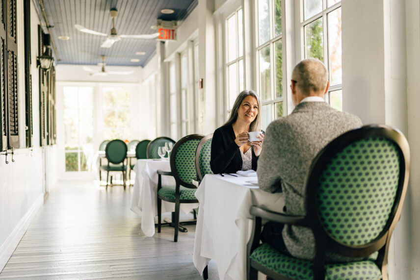A couple at a restaurant table at The Charles Hotel in Niagara-on-the-Lake.
