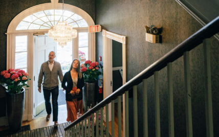 A couple walking into The Charles Hotel in Niagara-on-the-Lake.