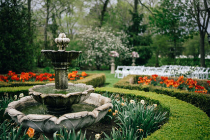 A fountain surrounded by flowers at The Charles Hotel in Niagara-on-the-Lake.