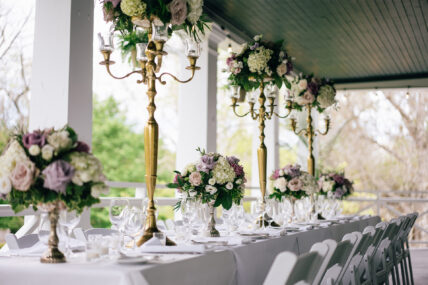 An outdoor wedding table on a covered porch at The Charles Hotel in Niagara-on-the-Lake.