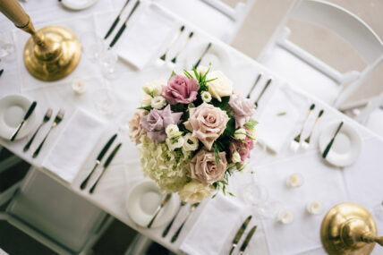 A flower centrepiece on a table with a white table cloth at The Charles Hotel in Niagara-on-the-Lake.