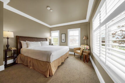 A bedroom in a suite at Harbour House Hotel in Niagara-on-the-Lake.