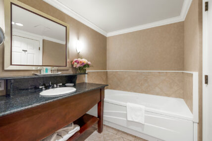 A bathroom in a premium room in Harbour House Hotel in Niagara-on-the-Lake.