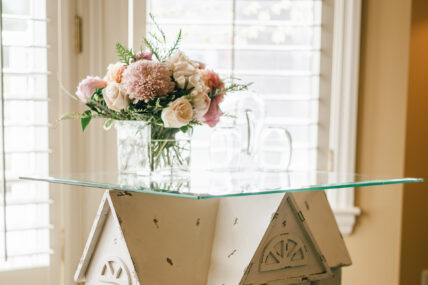 Flowers on a glass table at Harbour House Hotel in Niagara-on-the-Lake.