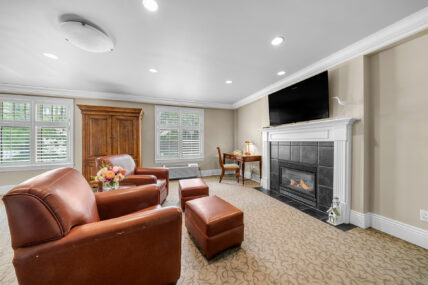 A TV area in a superior room at Harbour House Hotel in Niagara-on-the-Lake.