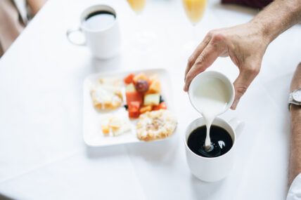 Cream being poured into a cup of coffee at Harbour House Hotel in Niagara-on-the-Lake.