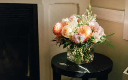 Flowers in an ornate vase at Niagara's Finest Hotels.