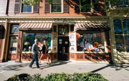 A couple going for a walk near Niagara's Finest Hotels in Niagara-on-the-Lake.