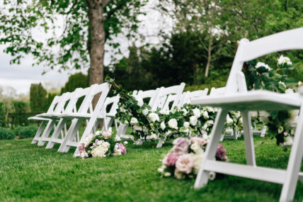 Front row of chairs at the wedding venue of the Charles Hotel in Niagara-on-the-Lake.