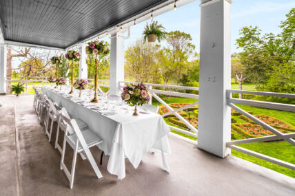 A wedding table with a view of the gardens at The Charles Hotel in Niagara-on-the-Lake.