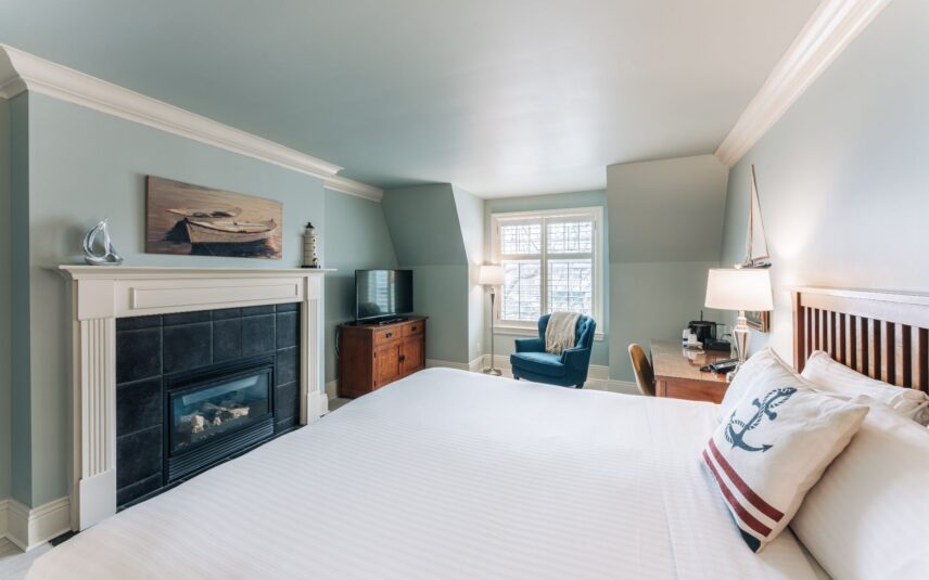 A premium room with fireplace at Harbour House Hotel in Niagara-on-the-Lake.