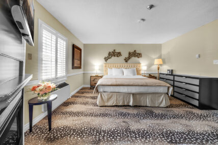 A wide view of the Club Room with Fireplace at the Shaw Club in Niagara-on-the-Lake.