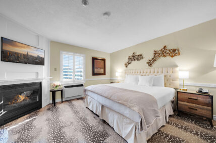 A wide view of the Club Room with Fireplace at the Shaw Club in Niagara-on-the-Lake.