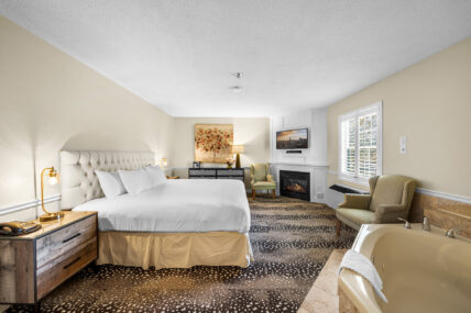 A side view of the Club Room with Whirlpool and Fireplace at the Shaw Club in Niagara-on-the-Lake.