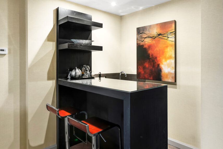 A seating area in a king suite room at the Shaw Club in Niagara-on-the-Lake.