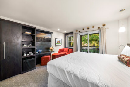 A superior king room with a balcony at the Shaw Club in Niagara-on-the-Lake.