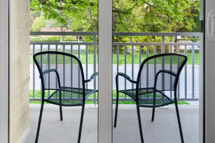 Chairs on a balcony in a superior king room at the Shaw Club in Niagara-on-the-Lake.