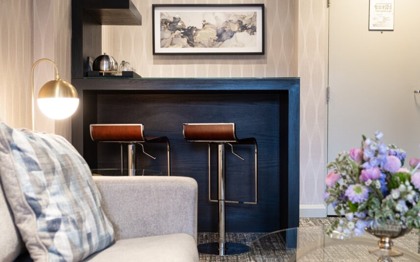 A seating area in a king suite room at the Shaw Club in Niagara-on-the-Lake.