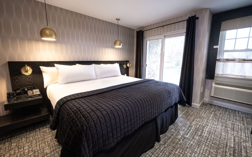 A king suite bed at the Shaw Club in Niagara-on-the-Lake.