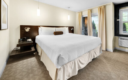 A king suite bed at the Shaw Club in Niagara-on-the-Lake.
