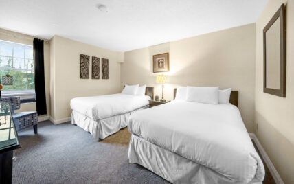 Standard Guest Room with 2 Double Beds at Shaw Club Hotel