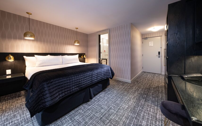 A superior king room with a balcony at the Shaw Club in Niagara-on-the-Lake.