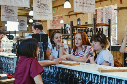 A group wine tasting during the Wine Trolley Tour in Niagara on the Lake