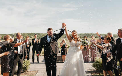 A couple at their winery wedding at Queenston Mile Vineyard