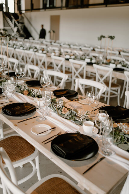 Tables set for a wine country wedding at Queenston Mile Vineyard