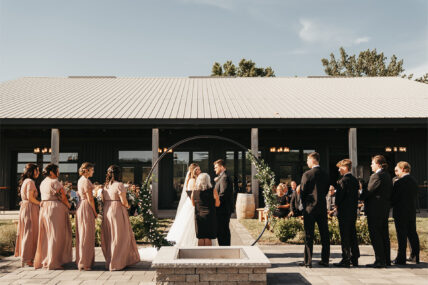 A couple getting married at Queenston Mile Vineyard in Niagara on the Lake