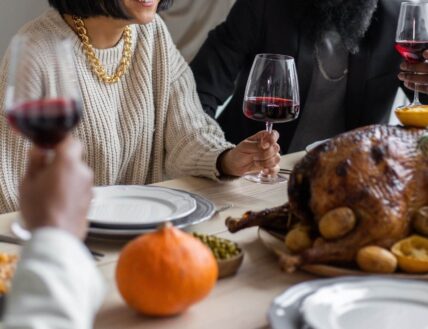 A family enjoying Thanksgiving dinner with beautiful table decor in Niagara-on-the-Lake.