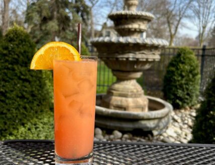 Niagara’s Finest Hotels’ Niagara Peach Fizz cocktail at the Hob Nob Restaurant in Niagara-on-the-Lake.