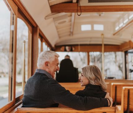 Couples enjoying Suds and Spirits Trolley Tour in Niagara-on-the-Lake.