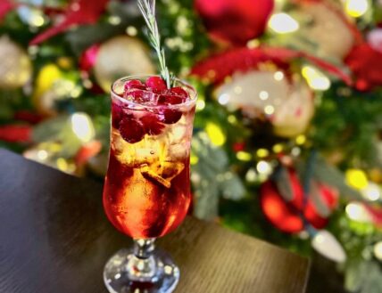 Red Icicle Icewine cocktail with fresh cranberries and rosemary at Zee's Wine Bar & Grill in Niagara-on-the-Lake.