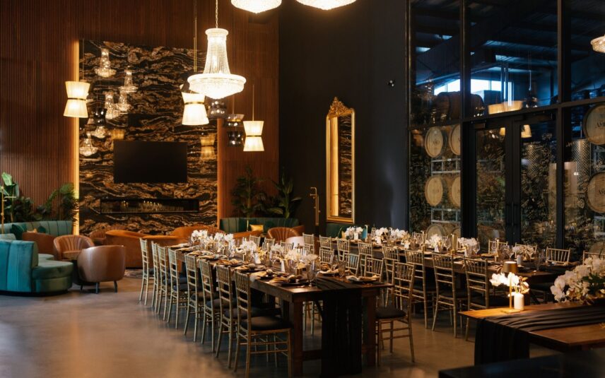 A luxurious black and gold wedding reception at vineyard wedding venue Amo Estate Winery in Niagara on the Lake