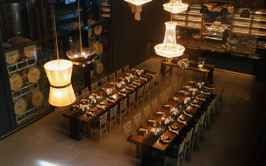 Harvest table reception in The Tasting Room a wedding venue at Amo Estate Winery in Niagara on the Lake